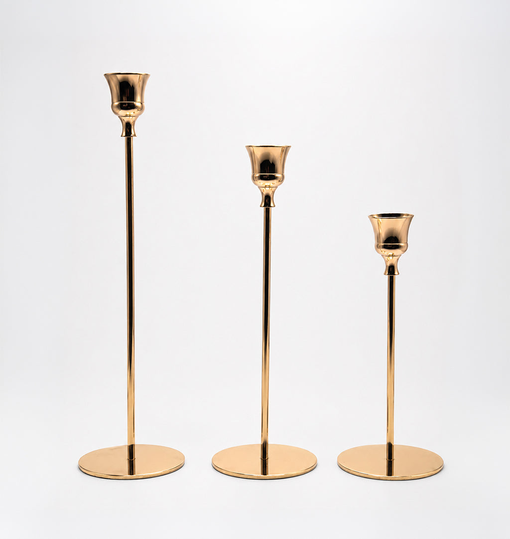 Candelabros Solenne de metal dorado, set de 3